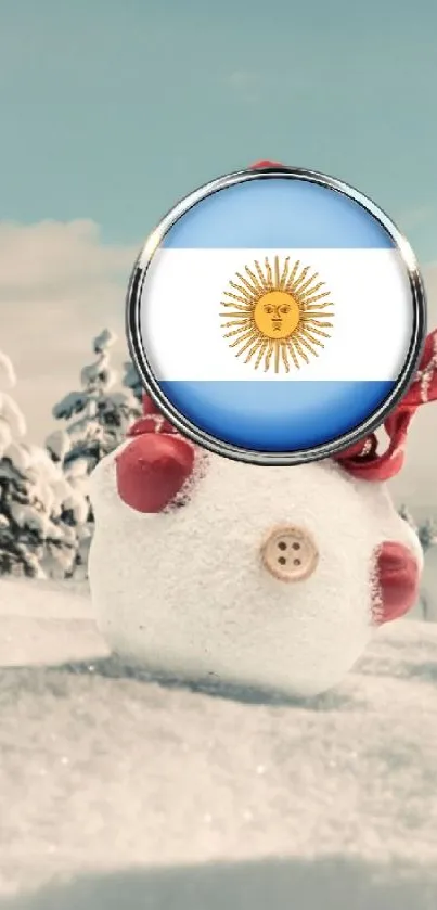 Snowman with Argentina flag face in snowy landscape.