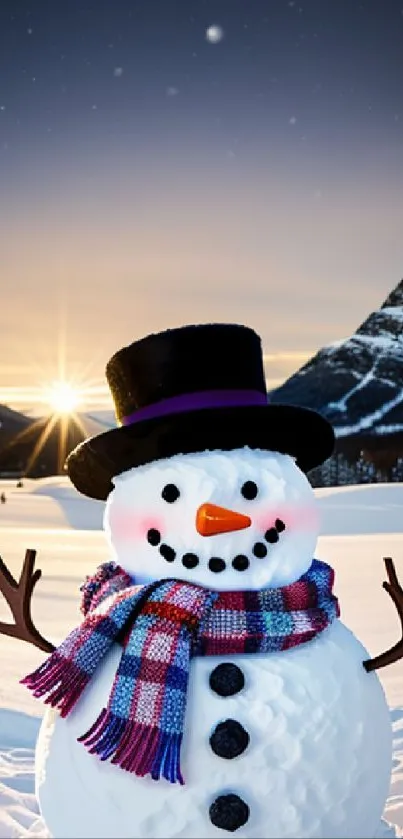 Snowman in vibrant sunset with snowy mountains.