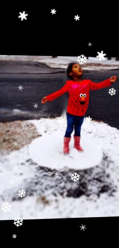 Child enjoying winter snow with falling snowflakes around.