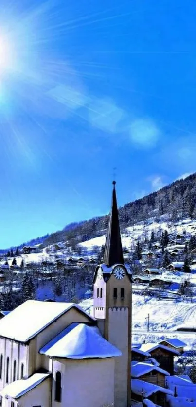 Stunning snowy church with bright blue sky and sunlit mountain village backdrop.