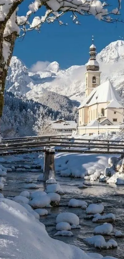 Snow-covered church and bridge in a serene winter setting.