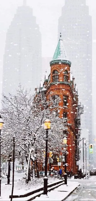 Red brick building in snowy city landscape with falling snowflakes.