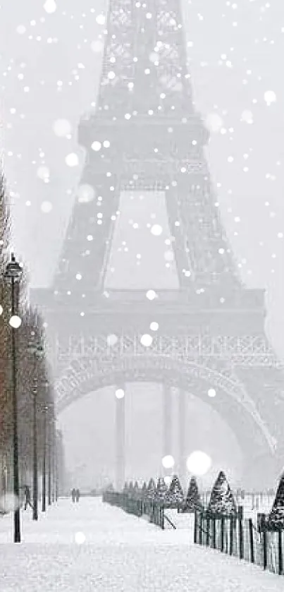 Snow-covered Eiffel Tower in winter landscape.