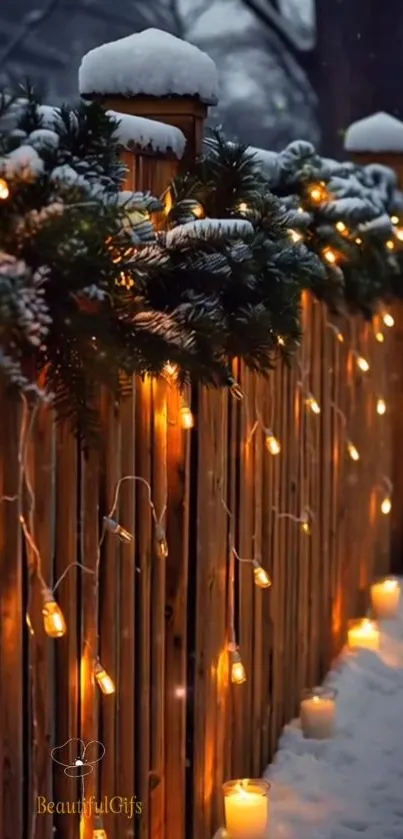 Snowy fence with warm festive lights glowing amidst winter night.