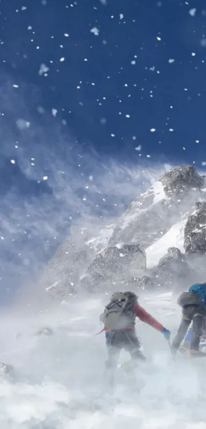 Climbers ascending a snowy mountain under a blue sky.