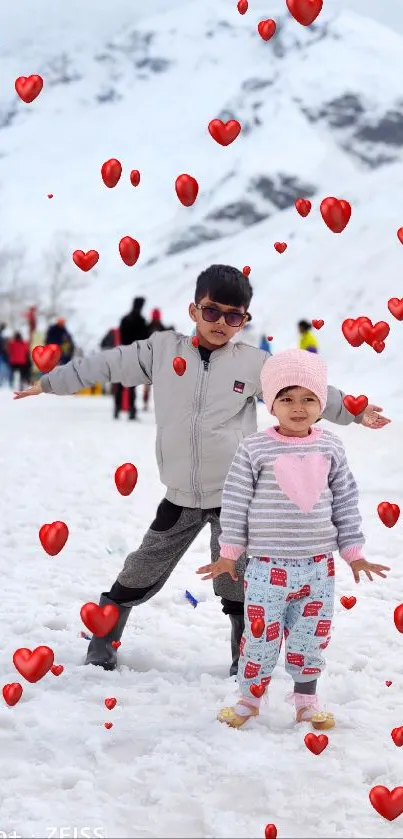 Kids enjoying fun in a snowy mountain landscape.