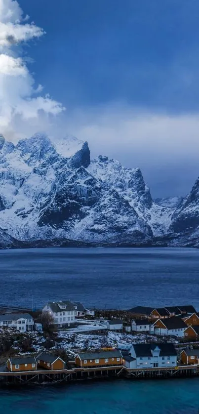 Snowy mountains, lake, and village at dusk mobile wallpaper.