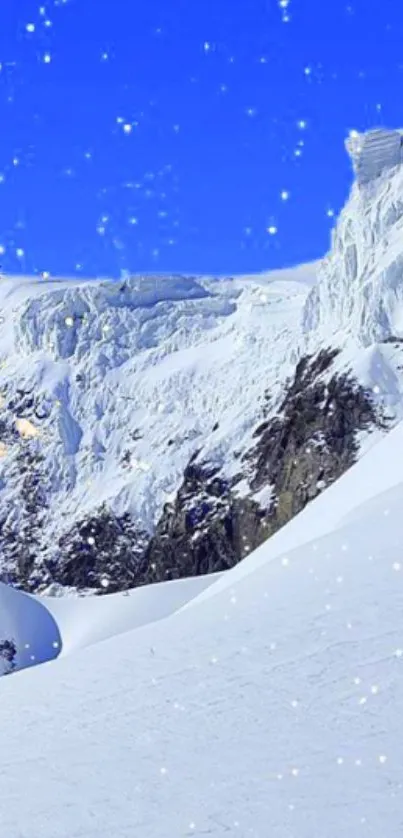 Snowy mountain under a bright blue sky with gentle snowfall.