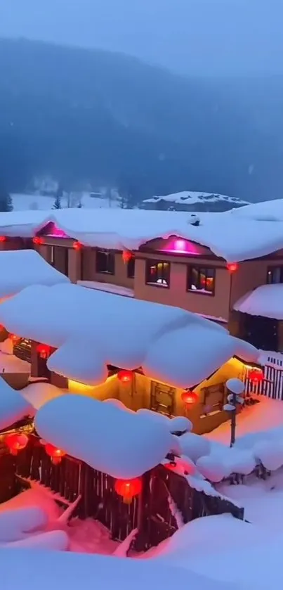 Illuminated chalet in snowy mountain landscape