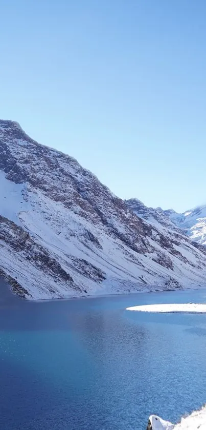 Serene snowy mountain and lake view for mobile wallpaper.