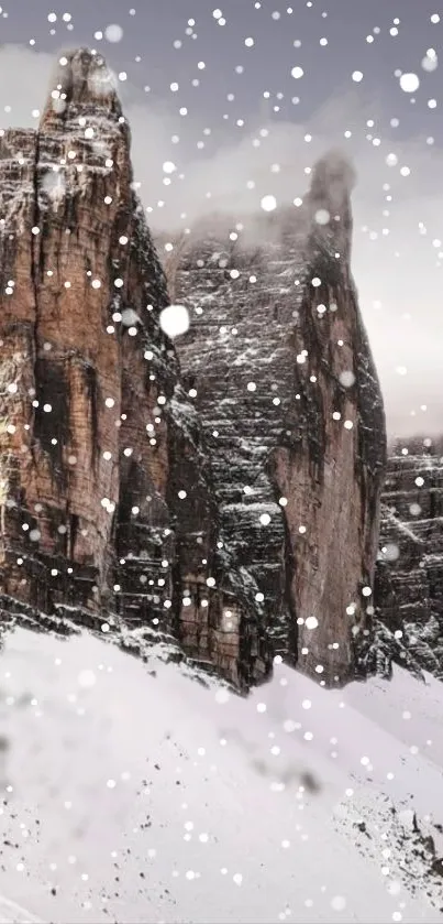 Snow-covered mountain with rock formations and falling snowflakes.