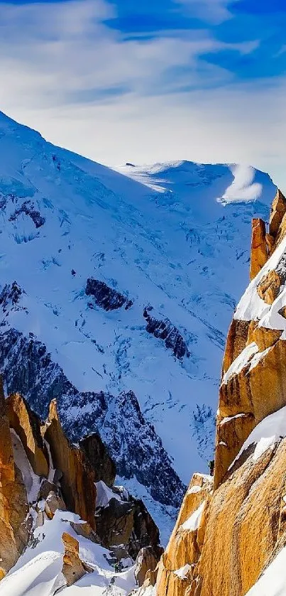 Snow-covered mountain peaks under a clear blue sky.