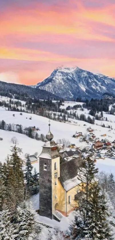 Sunrise over snowy mountain village with church.