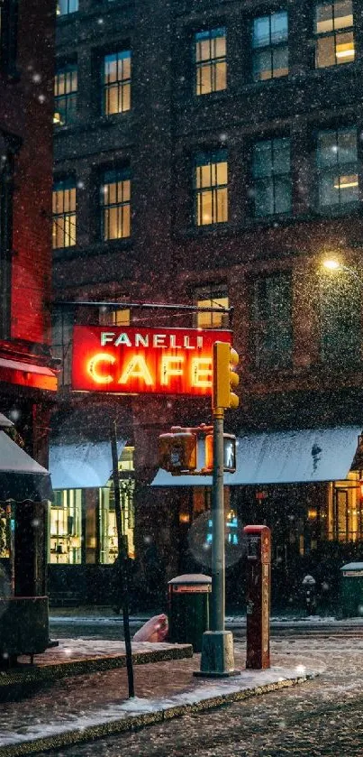 Snowy city street at night with glowing cafe sign.