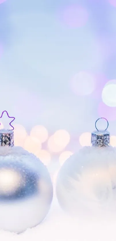 Winter wallpaper with silver ornaments and bokeh lights.