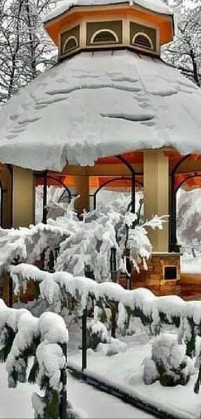 Snow-covered pavilion in a serene winter landscape.