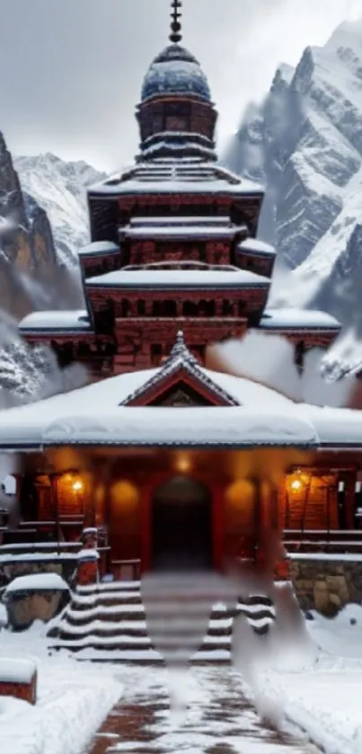 Snow-covered temple with mountain backdrop in winter.