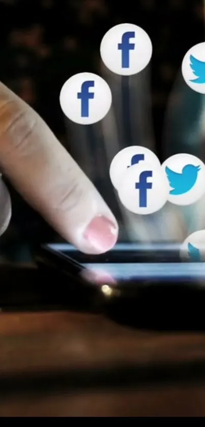 Finger touching smartphone with floating social media icons.