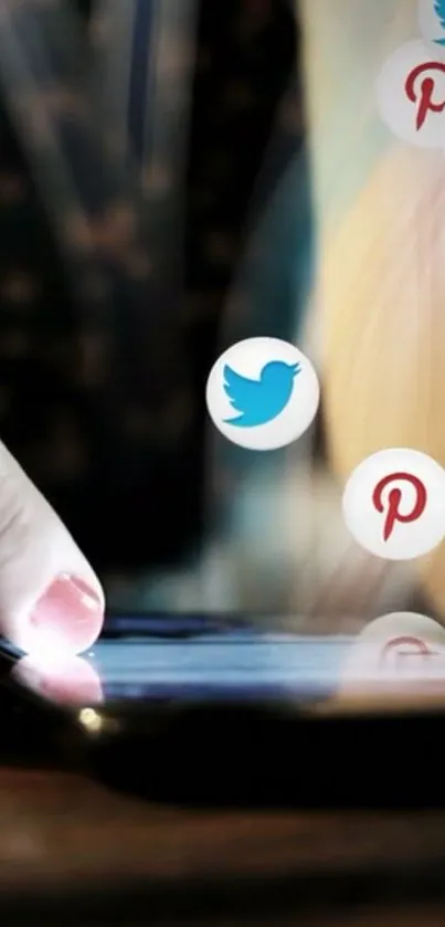 Finger interacting with smartphone displaying social media icons.