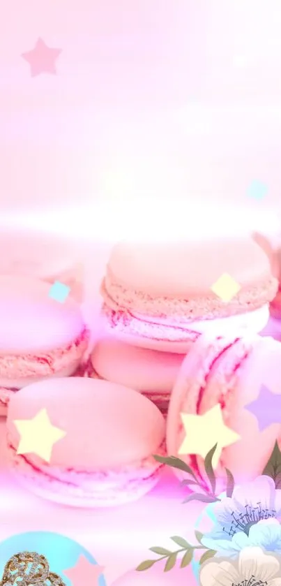 Soft pink macarons decorated with stars and floral elements on a dreamy wallpaper.