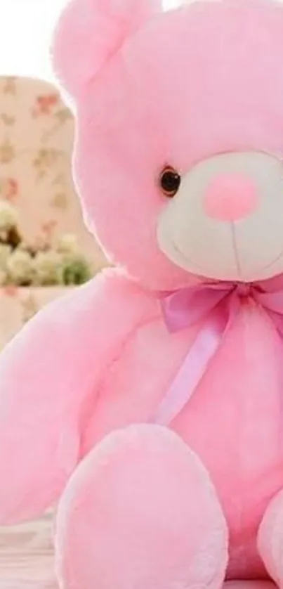 Adorable pink teddy bear with a soft texture and floral background.