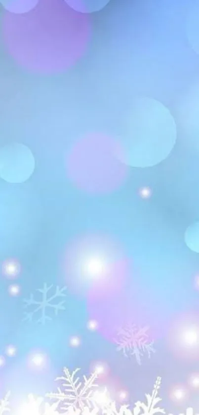 Soft winter wallpaper with glowing snowflakes and pastel blue hues.