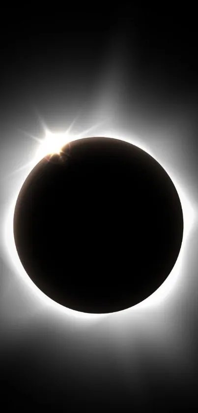 Solar eclipse with glowing aura wallpaper for smartphones.