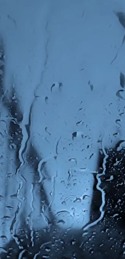 Mobile wallpaper with raindrops on a glass surface, exuding a soothing blue hue.