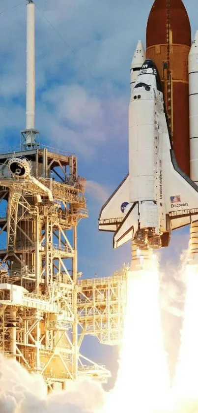 Mobile wallpaper of a space shuttle launching against a clear blue sky.