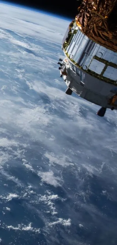 Spacecraft orbiting Earth with a view of the planet's surface and atmosphere.