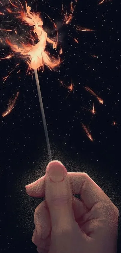 Hand holding sparkler with a starry night background.