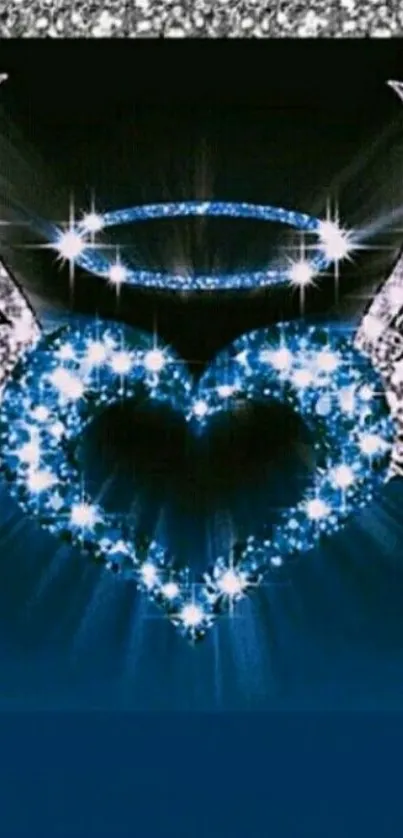 Sparkling heart with angel wings and a radiant halo in a blue design.