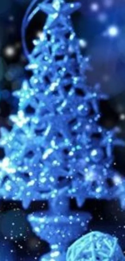 Sparkling blue Christmas tree with starry lights and snowflakes.