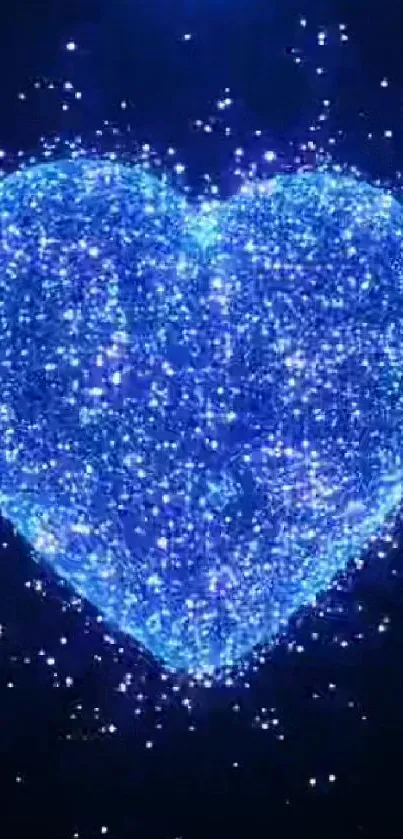 Dazzling blue heart with sparkling effect on a dark background.