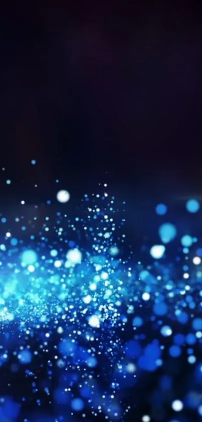 Sparkling blue light wallpaper with bokeh effect.