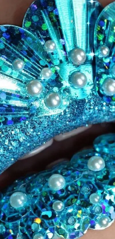 Close-up of sparkling blue lips with glitter and pearls.