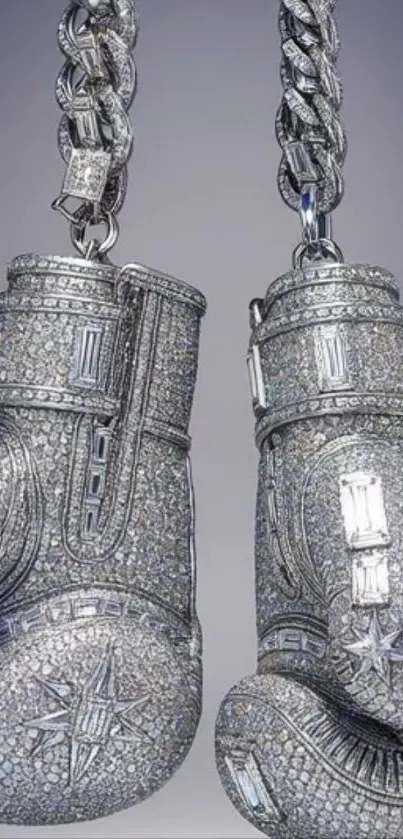 Diamond-studded boxing gloves jewelry on silver chains.
