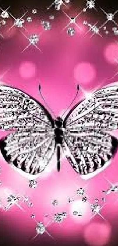 Sparkling butterfly with crystals on a pink background wallpaper.