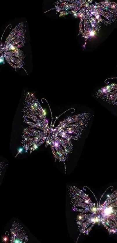 Sparkling butterflies on a dark background wallpaper.