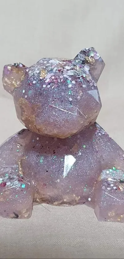 Lavender sparkling bear statue with glittering details.