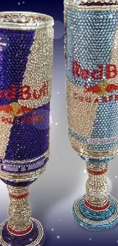 Crystal adorned Red Bull cans in blue tones.