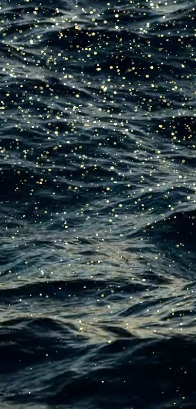 Dark ocean waves with golden sparkles creating a serene and elegant mobile wallpaper.