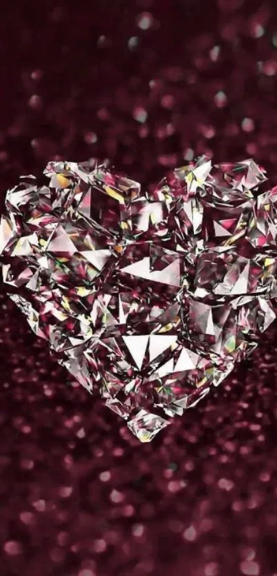 Sparkling diamond heart on maroon backdrop wallpaper.