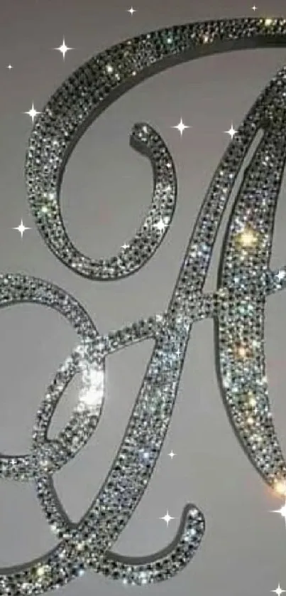 Diamond-encrusted letter A on a silver background.