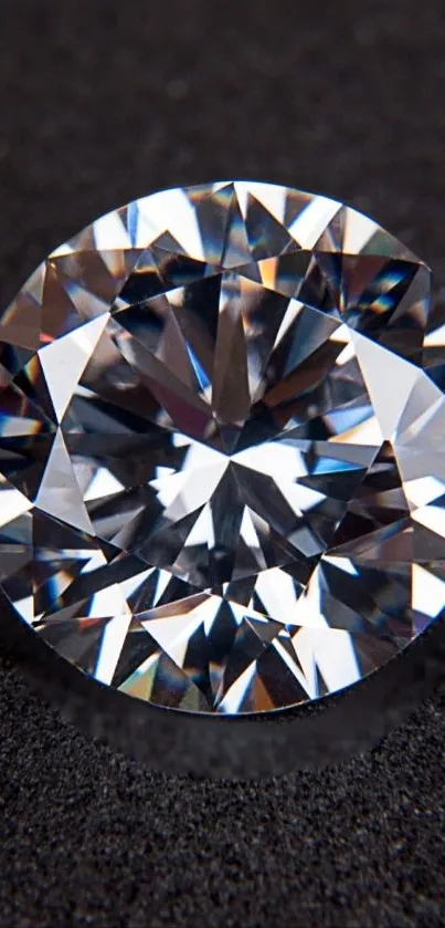 Beautifully cut diamond on black background shining brightly.