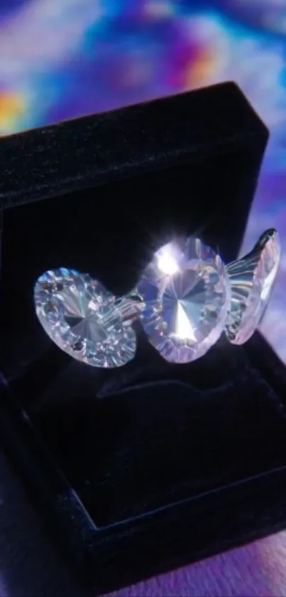 A sparkling diamond ring in a black box with a colorful background.