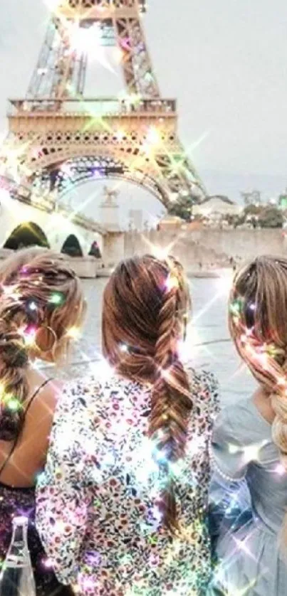 Three women with braids facing sparkling Eiffel Tower at dusk.