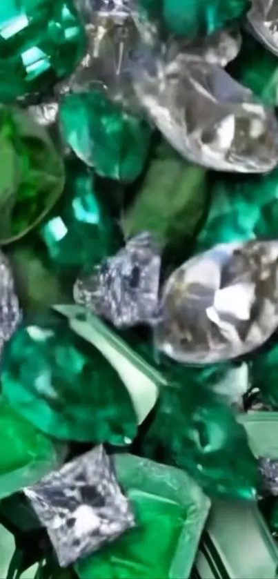 Cluster of sparkling emerald and silver gemstones wallpaper.