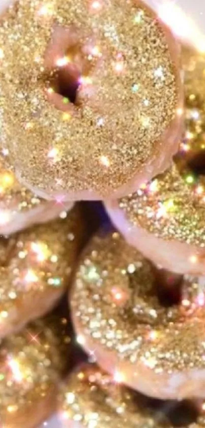 Close-up of gold glitter donuts with sparkling highlights.