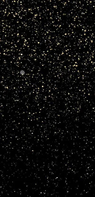 Sparkling golden stars on a black background, creating an elegant wallpaper.